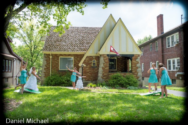 Bride playing cornhole on Wedding Day