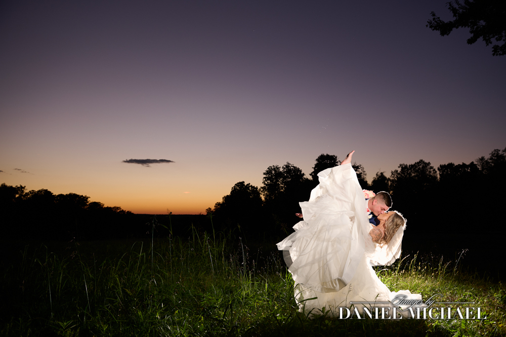 Couple kissing in field